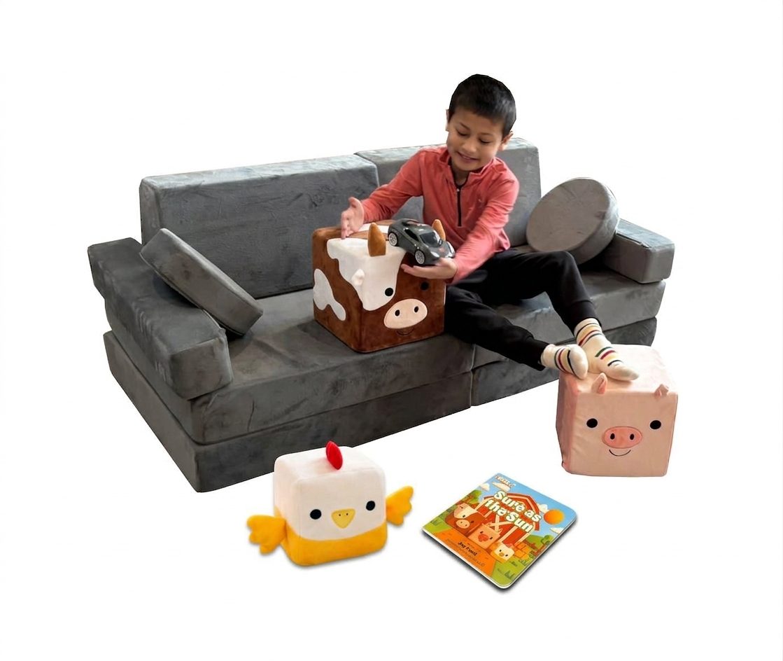 Child on the Mod Blox couch with Bloxters