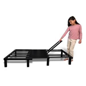A young girl assembling a couch metal frame from Mod Blox, showcasing the ease of metal furniture frame setup.